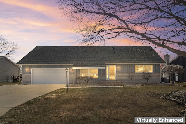 ranch-style house with roof with shingles, brick siding, concrete driveway, a garage, and board and batten siding