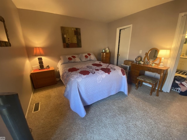 bedroom featuring visible vents and carpet flooring