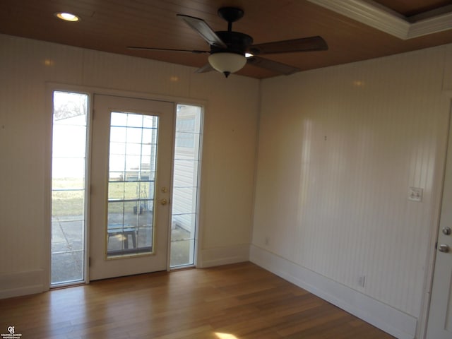 unfurnished room with recessed lighting, baseboards, wood finished floors, and a ceiling fan