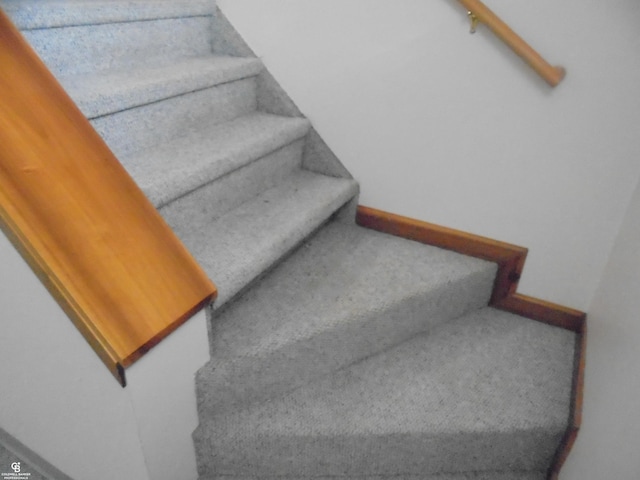 stairway with baseboards