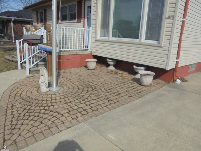 view of side of home featuring crawl space