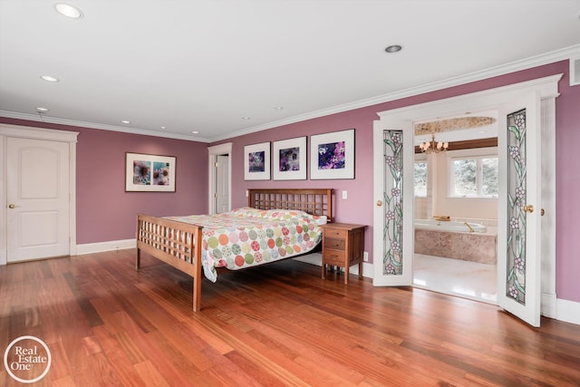 bedroom with a chandelier, wood finished floors, and ornamental molding