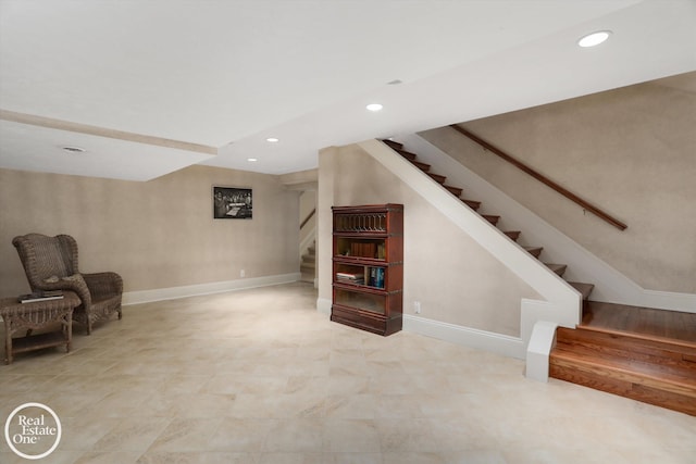 sitting room with recessed lighting, stairs, and baseboards