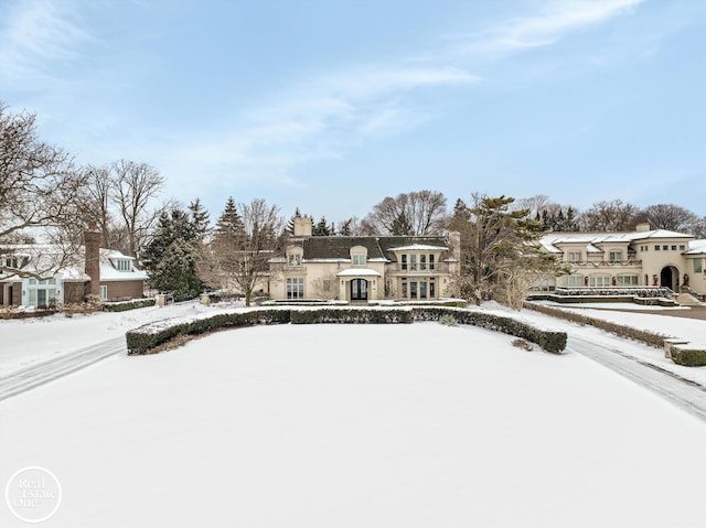 view of front of property featuring a residential view and stucco siding