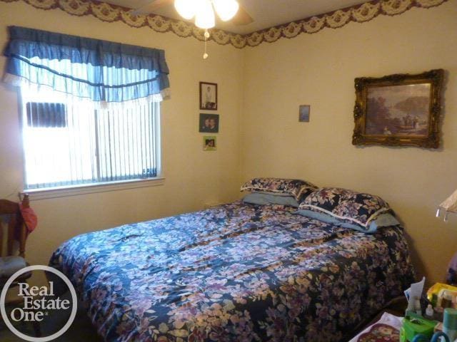 bedroom featuring ceiling fan