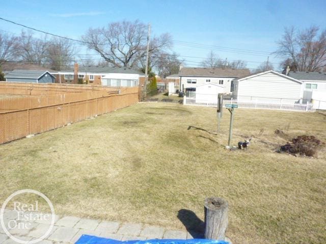 view of yard with fence