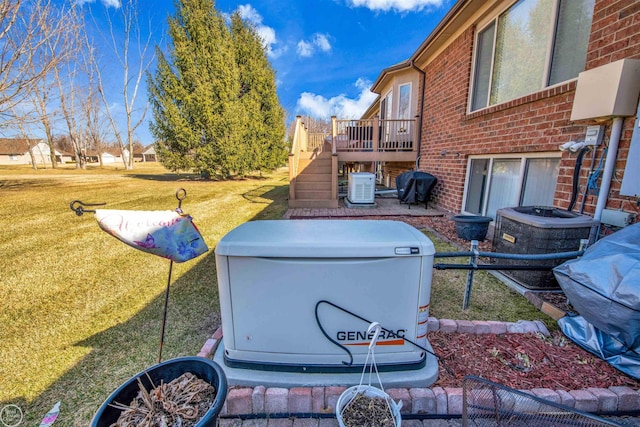 view of yard with stairway, central AC unit, and a wooden deck