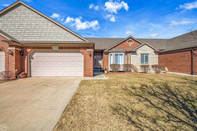 ranch-style home featuring a front lawn, roof with shingles, concrete driveway, an attached garage, and brick siding