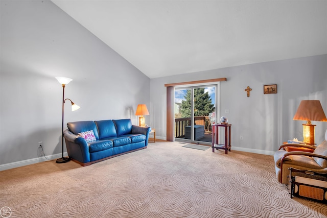 living area with baseboards, carpet floors, and high vaulted ceiling