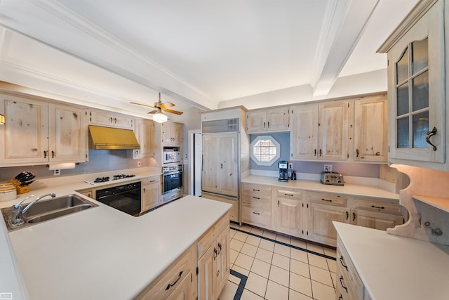 kitchen featuring beamed ceiling, under cabinet range hood, a sink, light countertops, and built in appliances