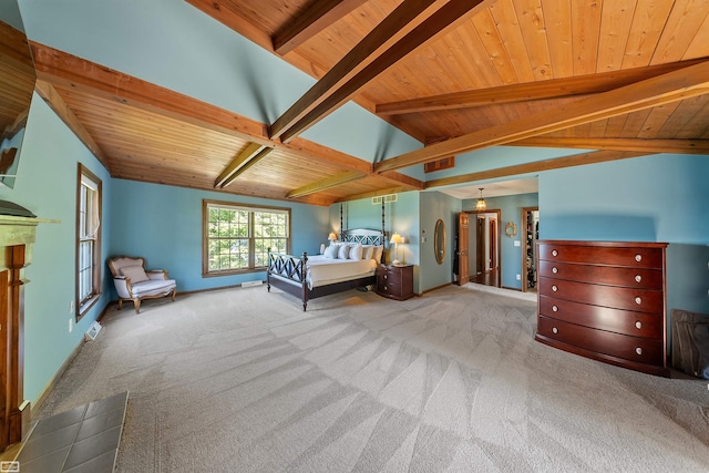 unfurnished bedroom featuring visible vents, carpet floors, baseboards, lofted ceiling with beams, and wood ceiling