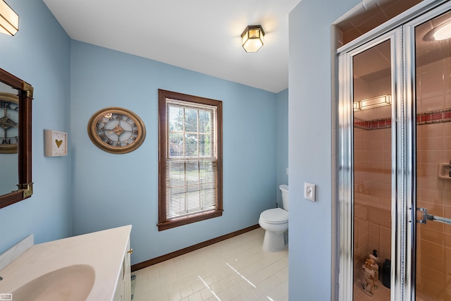 full bathroom with tile patterned flooring, a stall shower, toilet, and baseboards