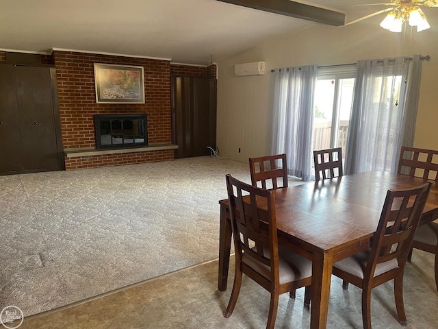 carpeted dining space with an AC wall unit, a brick fireplace, vaulted ceiling with beams, and ceiling fan