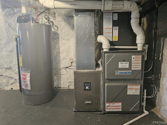 utility room with gas water heater and heating unit