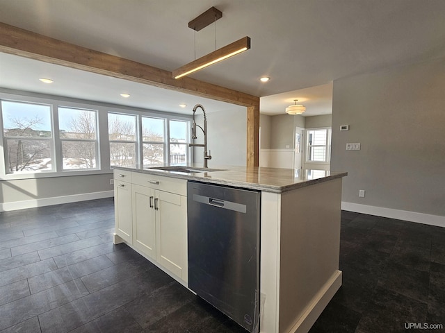 kitchen with light stone counters, beam ceiling, dishwasher, and a sink