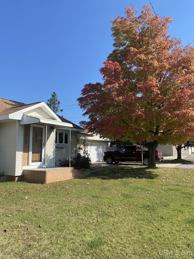 view of yard with an attached garage