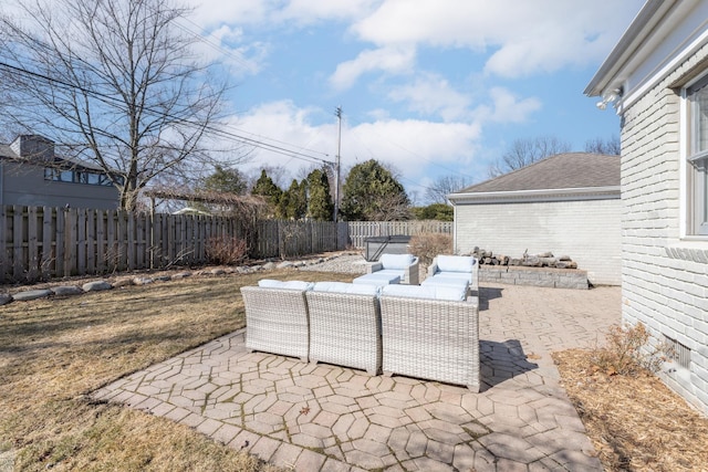 view of patio with an outdoor hangout area and a fenced backyard