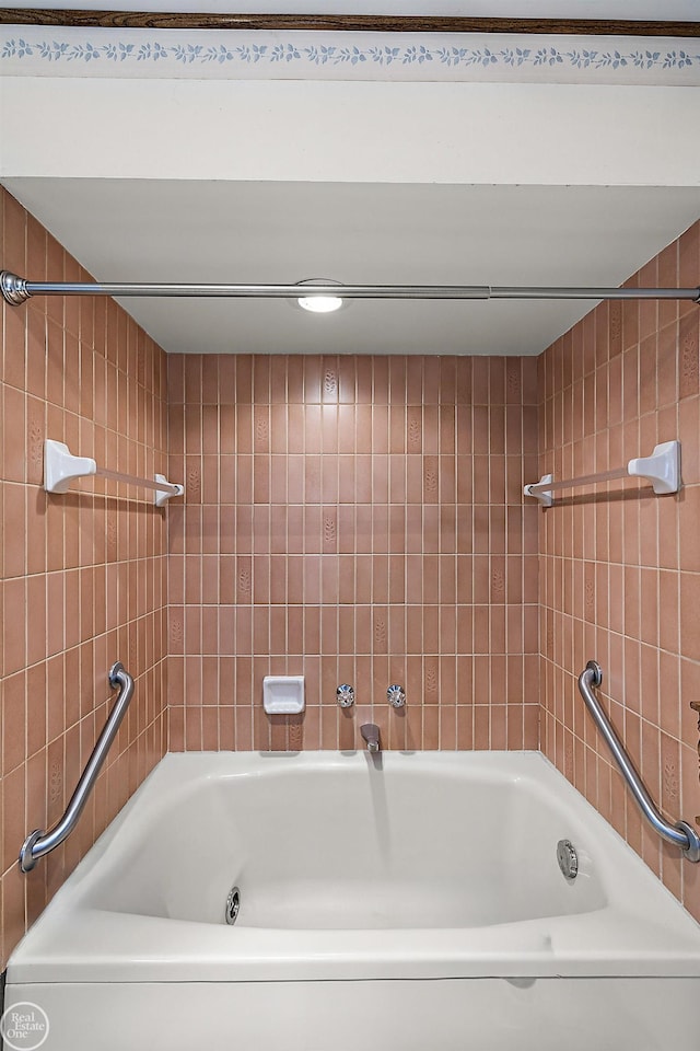 bathroom featuring a tub