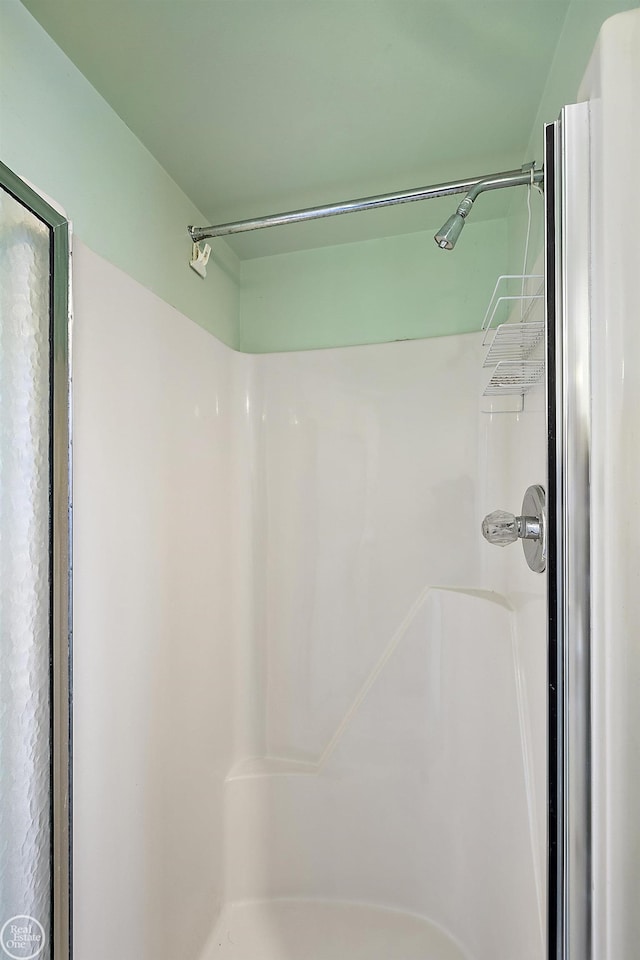 bathroom with a stall shower