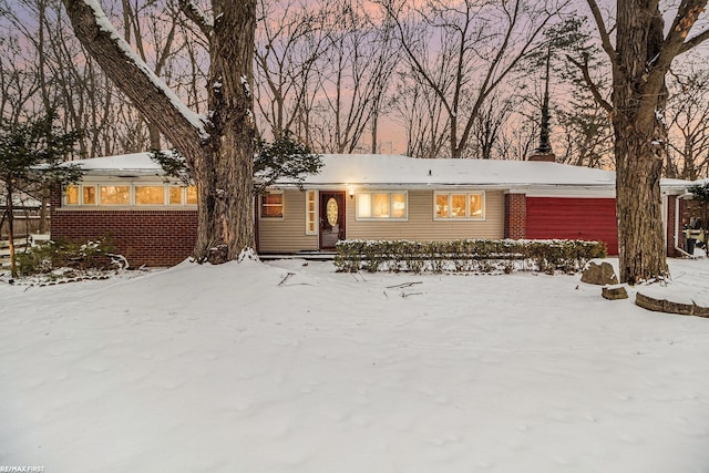 exterior space with brick siding