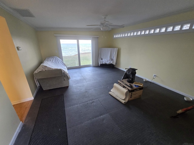 interior space featuring visible vents, baseboards, and ceiling fan