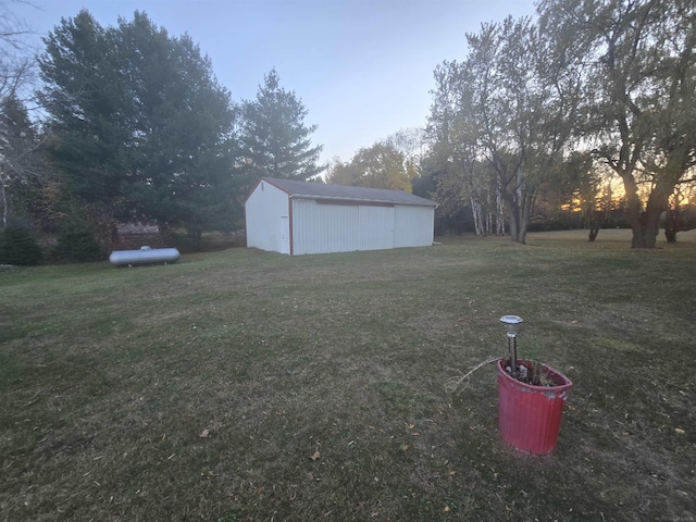 view of yard with an outbuilding and a pole building