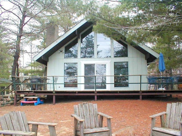 rear view of house with a chimney