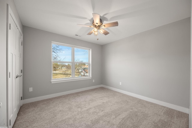 unfurnished bedroom with visible vents, baseboards, carpet, and ceiling fan