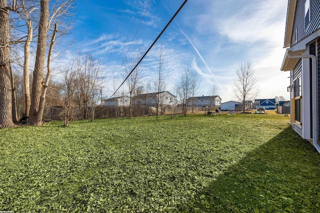 view of yard with fence