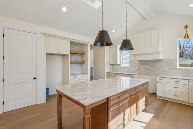 7474 Connies Dr, Shelby Twp, MI 48316 - kitchen with open shelves, light stone countertops, lofted ceiling with beams, and light wood finished floors