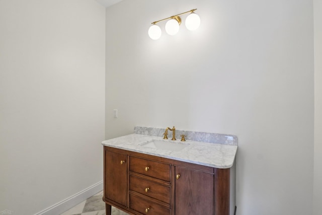 7474 Connies Dr, Shelby Twp, MI 48316 - bathroom featuring vanity and baseboards