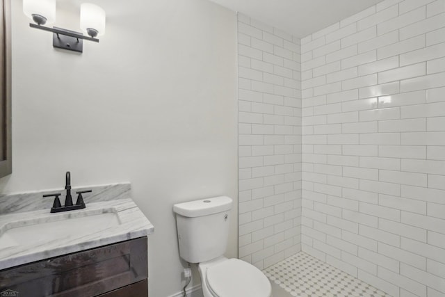 7474 Connies Dr, Shelby Twp, MI 48316 - full bathroom with vanity, toilet, and tiled shower