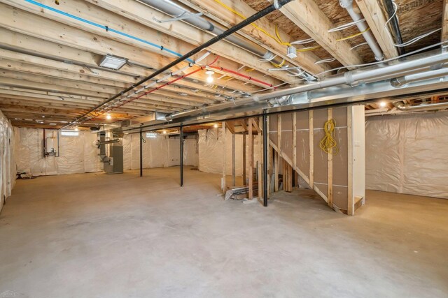 7474 Connies Dr, Shelby Twp, MI 48316 - unfinished below grade area featuring heating unit