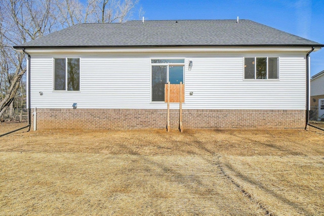 7474 Connies Dr, Shelby Twp, MI 48316 - back of house featuring roof with shingles