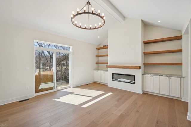 7474 Connies Dr, Shelby Twp, MI 48316 - unfurnished living room with light wood-type flooring, beamed ceiling, a glass covered fireplace, an inviting chandelier, and baseboards