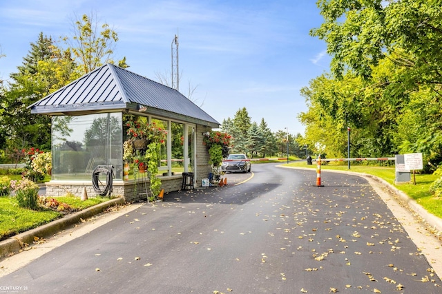 65 Sea Ray Blvd Unit 7, Harrison Twp, MI 48045 - view of street with curbs and a gated entry
