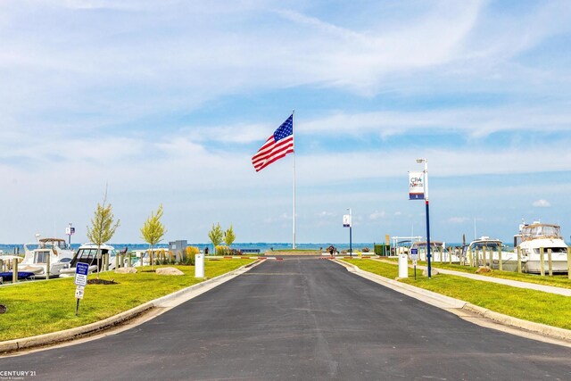 65 Sea Ray Blvd Unit 7, Harrison Twp, MI 48045 - view of road with curbs and a water view