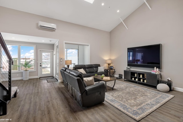 65 Sea Ray Blvd Unit 7, Harrison Twp, MI 48045 - living area featuring high vaulted ceiling, wood finished floors, a wall unit AC, recessed lighting, and baseboards