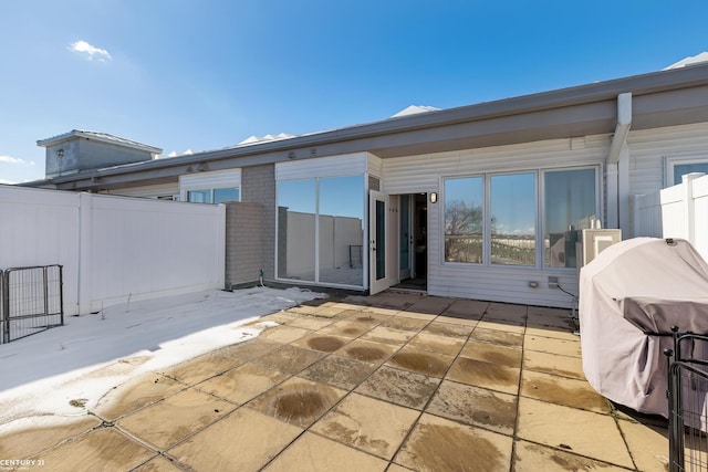 65 Sea Ray Blvd Unit 7, Harrison Twp, MI 48045 - view of patio featuring a grill and fence