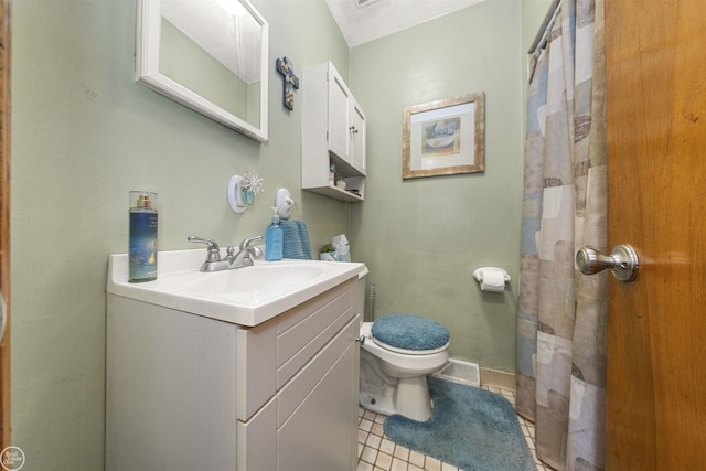 full bathroom with baseboards, toilet, curtained shower, vanity, and tile patterned flooring