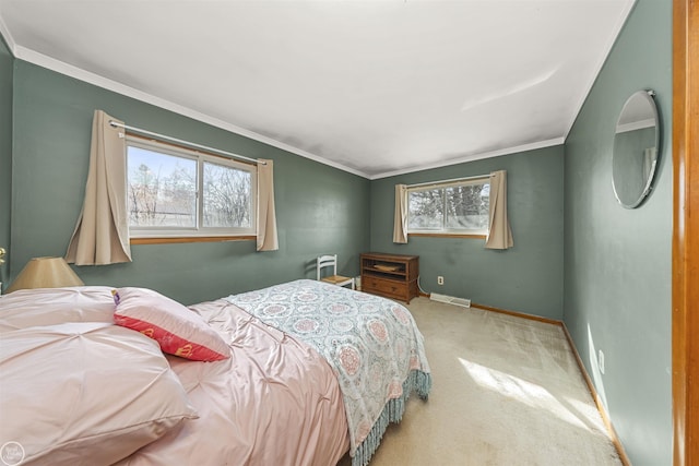 bedroom with visible vents, carpet, baseboards, and crown molding