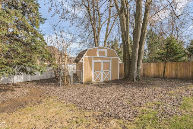view of shed with fence