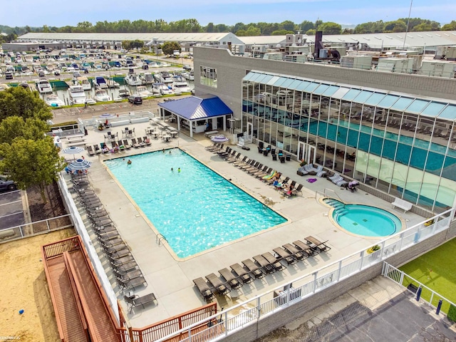 49 Sea Ray Blvd, Harrison Twp, MI 48045 - community pool featuring a patio and fence