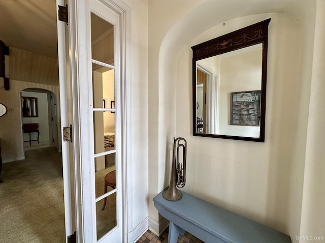 hall with arched walkways
