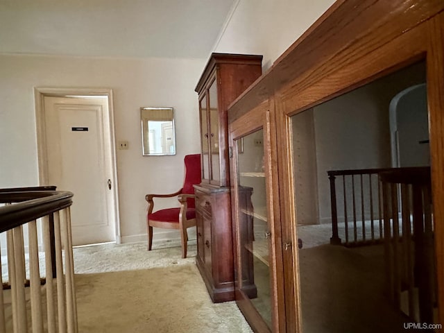 hall with carpet floors