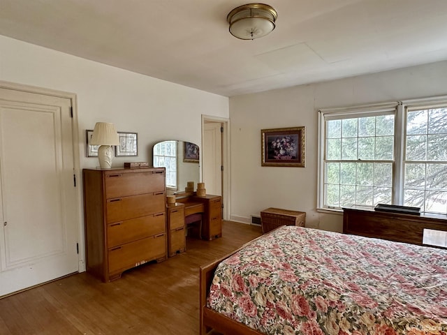 bedroom featuring light wood-style flooring
