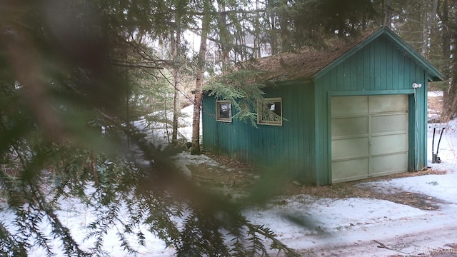 view of snow covered garage