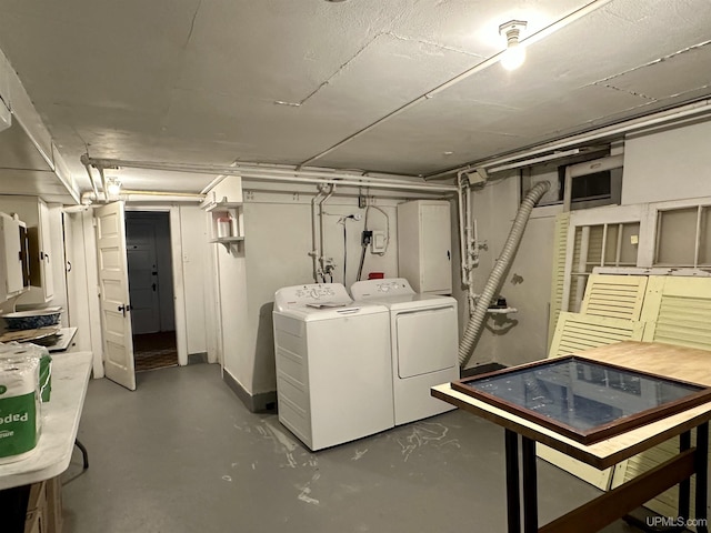 finished basement with washer and clothes dryer