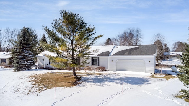 102 Phoxy Ln, Indian River, MI 49749 - ranch-style home featuring a garage