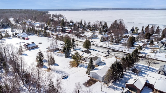 102 Phoxy Ln, Indian River, MI 49749 - snowy aerial view featuring a residential view and a water view
